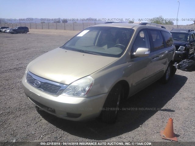 KNDMG4C77B6377471 - 2011 KIA SEDONA LX GOLD photo 2