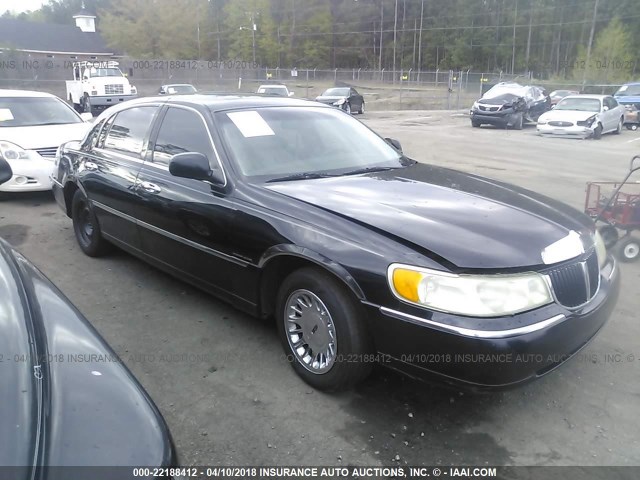 1LNHM83W2XY656973 - 1999 LINCOLN TOWN CAR CARTIER BLACK photo 1