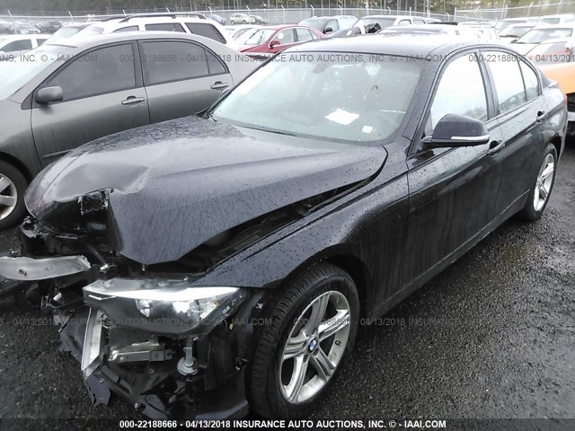 WBA3C3C53EP660817 - 2014 BMW 320 I/XDRIVE BLACK photo 2