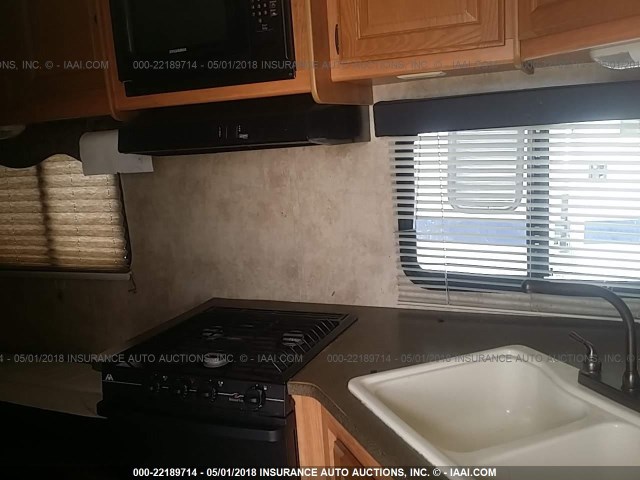 4YDT25F2796410928 - 2009 KEYSTONE PASSPORT WHITE photo 6