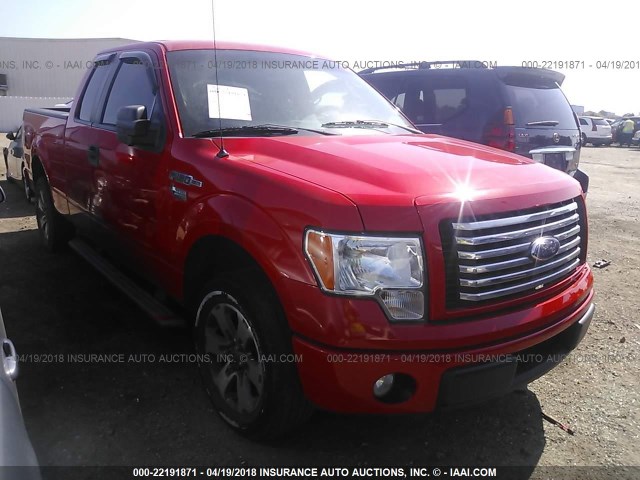 1FTEX1CM1CFB23670 - 2012 FORD F150 SUPER CAB RED photo 1