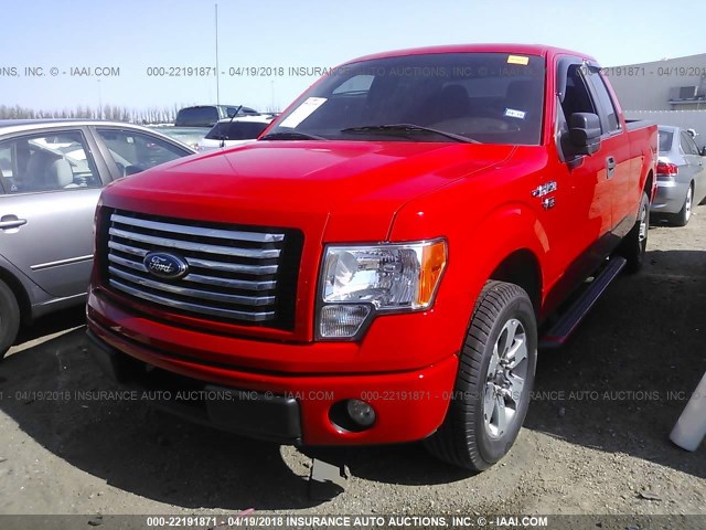 1FTEX1CM1CFB23670 - 2012 FORD F150 SUPER CAB RED photo 2