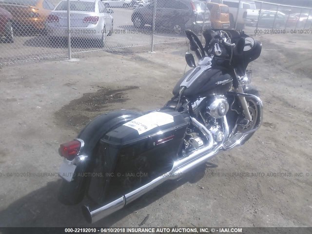 1HD1KB4189Y673869 - 2009 HARLEY-DAVIDSON FLHX BLACK photo 4