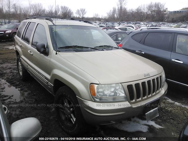 1J4GW58N6YC140665 - 2000 JEEP GRAND CHEROKEE LIMITED GOLD photo 1