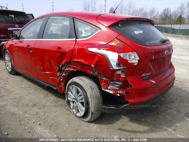 1FAHP3M24CL261992 - 2012 FORD FOCUS SEL RED photo 3