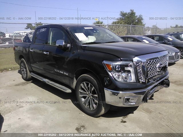 1N6AA1E68JN502728 - 2018 NISSAN TITAN SV/SL/PLATINUM RESERVE BLACK photo 1