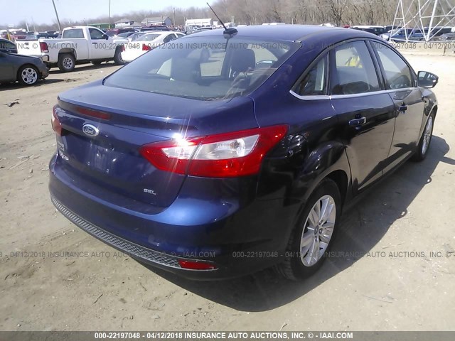 1FAHP3H24CL148036 - 2012 FORD FOCUS SEL BLUE photo 4