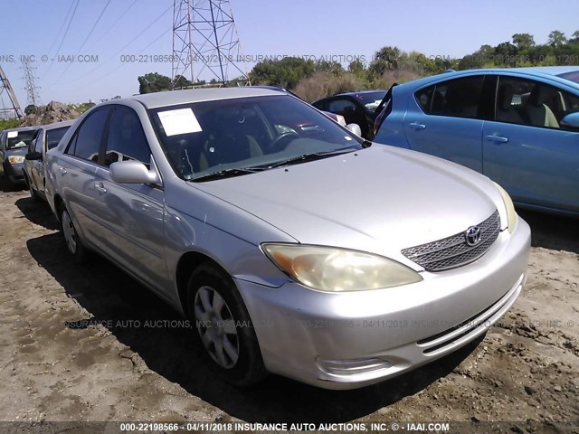 4T1BE32KX3U186195 - 2003 TOYOTA CAMRY LE/XLE/SE SILVER photo 1