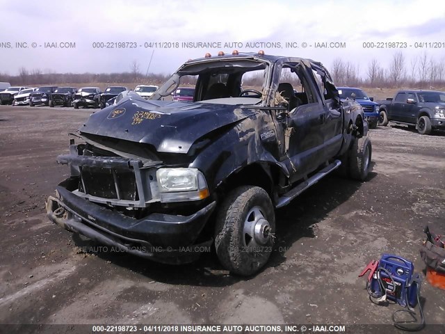 1FTWW33P83EB65692 - 2003 FORD F350 SUPER DUTY BLACK photo 2