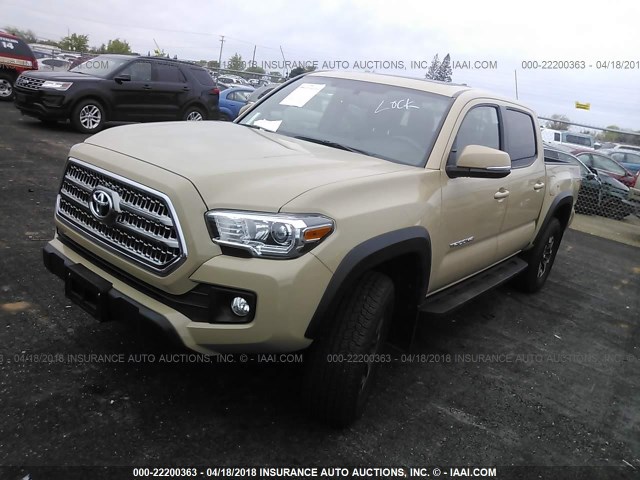 5TFCZ5AN5HX087696 - 2017 TOYOTA TACOMA DBL CAB/SR/TRDSPT/OR/PRO ოქროსფერი ფოტო 2