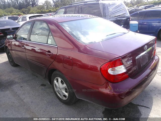 JTDBE32KX20092988 - 2002 TOYOTA CAMRY LE/XLE/SE RED photo 3