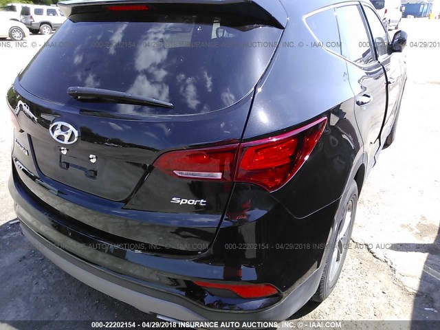 5NMZT3LB2JH091576 - 2018 HYUNDAI SANTA FE SPORT  BLACK photo 4