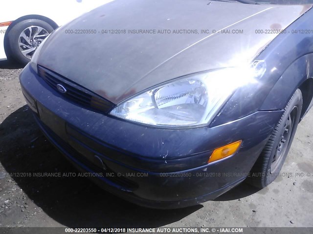 1FAFP33P42W189242 - 2002 FORD FOCUS LX BLUE photo 6