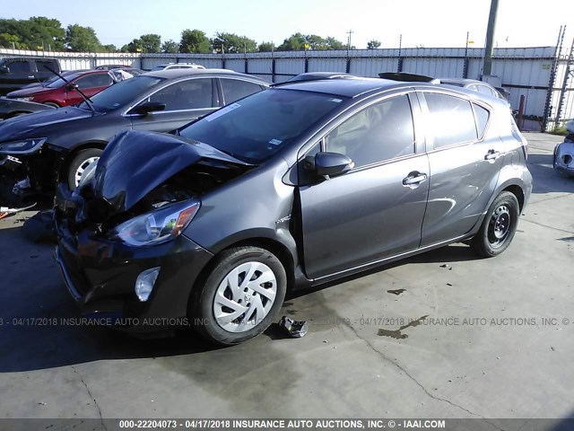 JTDKDTB36G1131590 - 2016 TOYOTA PRIUS C GRAY photo 2