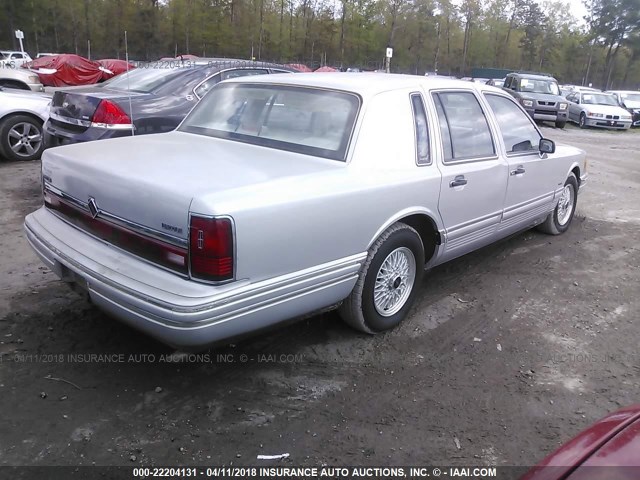 1LNCM81W5MY721808 - 1991 LINCOLN TOWN CAR EXECUTIVE SILVER photo 4