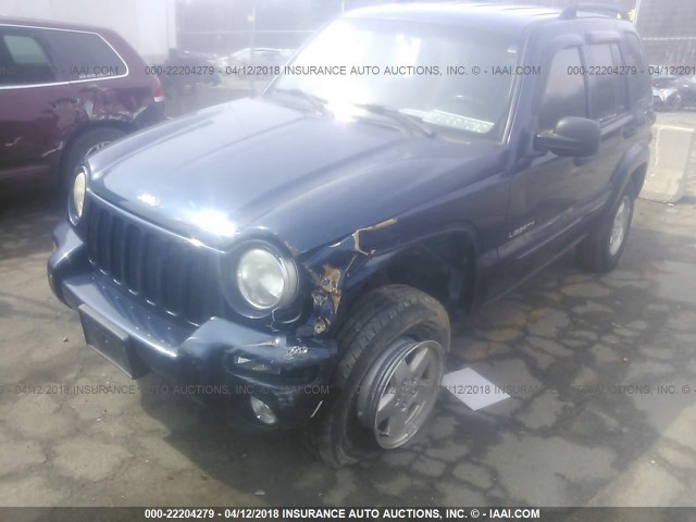 1J4GL58K52W121710 - 2002 JEEP LIBERTY LIMITED BLUE photo 6