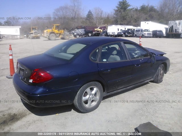 1FAFP53UX2A121039 - 2002 FORD TAURUS SE BLUE photo 4