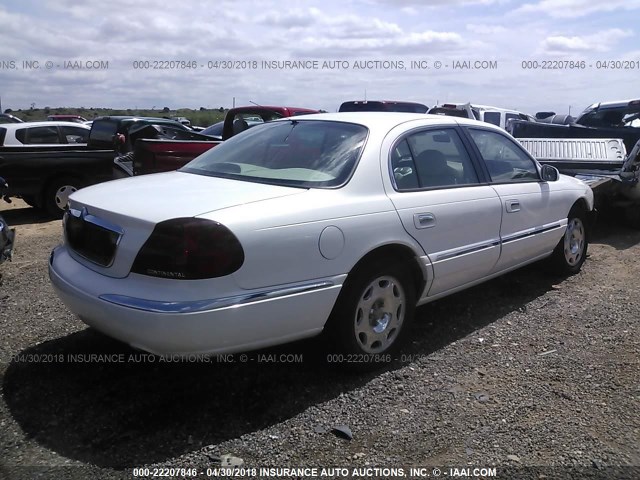 1LNHM97V0XY700508 - 1999 LINCOLN CONTINENTAL  WHITE photo 4