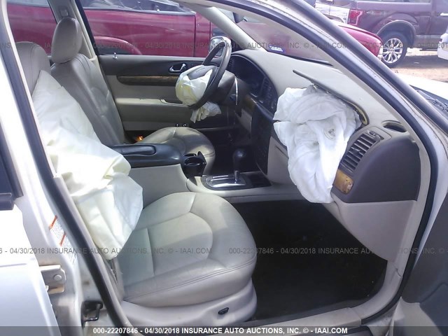 1LNHM97V0XY700508 - 1999 LINCOLN CONTINENTAL  Weiß Foto 5