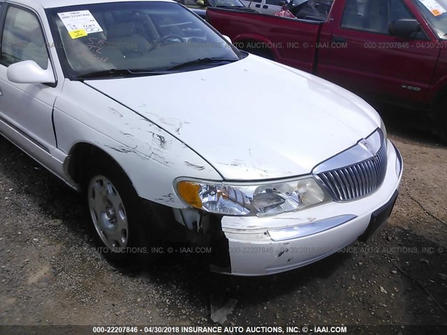 1LNHM97V0XY700508 - 1999 LINCOLN CONTINENTAL  Weiß Foto 6
