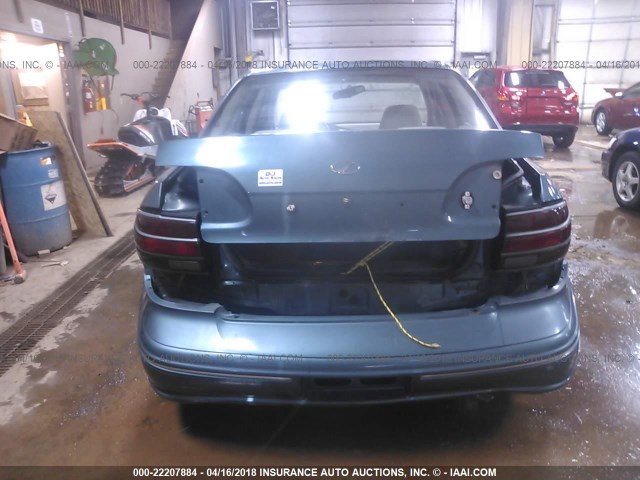 1G3NB52MXX6324433 - 1999 OLDSMOBILE CUTLASS GL მწვანე ფოტო 6