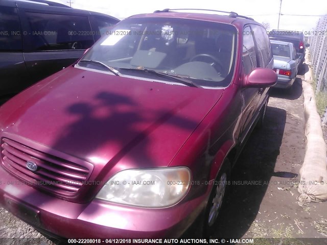 KNDUP131X26261322 - 2002 KIA SEDONA EX/LX RED photo 2