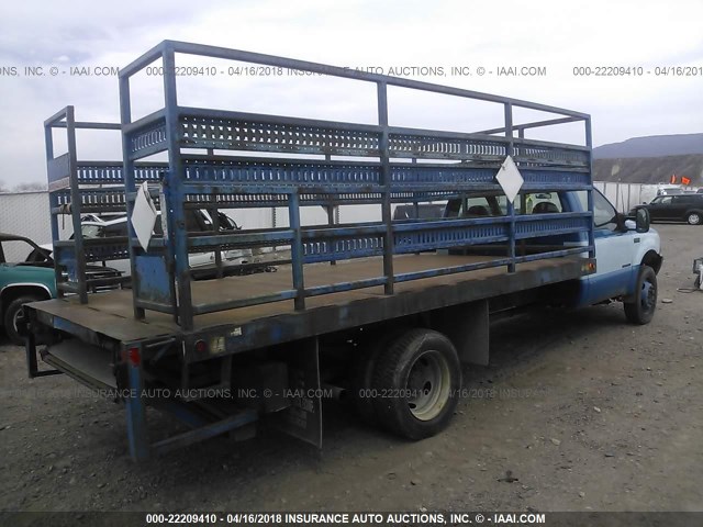 1FDAF57F2XED12808 - 1999 FORD F550 SUPER DUTY BLUE photo 4