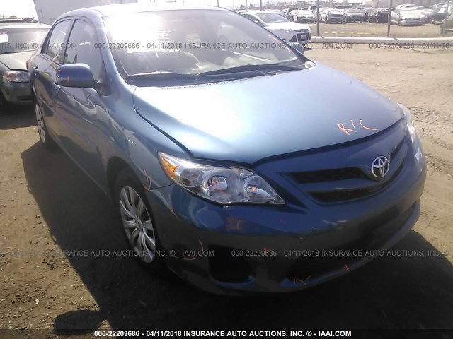 5YFBU4EE9CP069787 - 2012 TOYOTA COROLLA S/LE BLUE photo 1