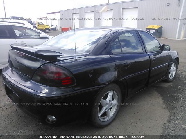 1G2NV52E1YM738315 - 2000 PONTIAC GRAND AM GT1 BLACK photo 4