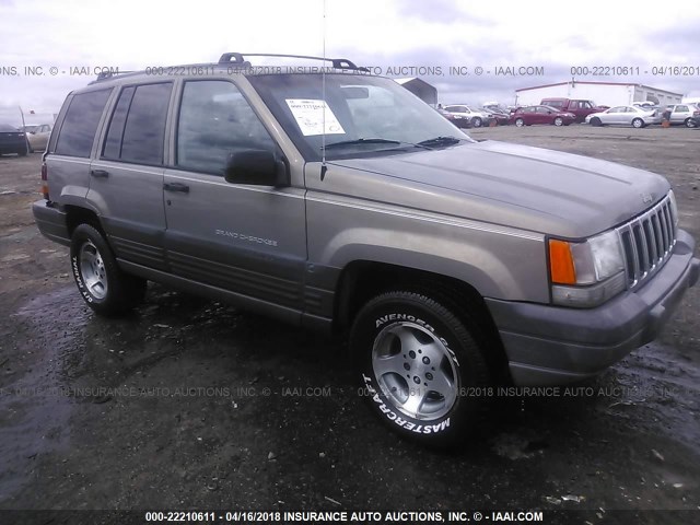 1J4GZ58S7VC662116 - 1997 JEEP GRAND CHEROKEE LAREDO/TSI GRAY photo 1