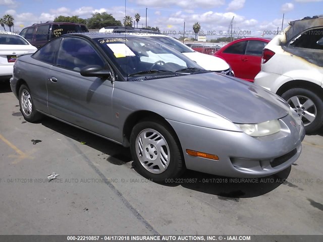 1G8ZY127XXZ282485 - 1999 SATURN SC2 Champagne photo 1