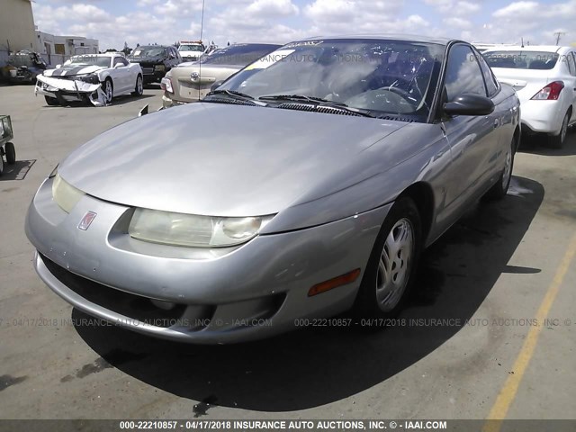 1G8ZY127XXZ282485 - 1999 SATURN SC2 Champagne photo 2