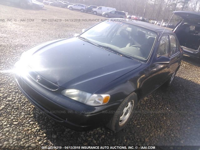 2T1BR12E8XC166652 - 1999 TOYOTA COROLLA VE/CE/LE BLACK photo 2