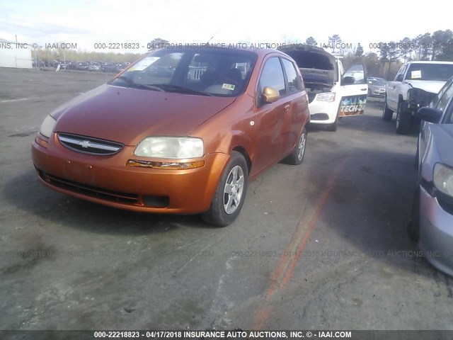 KL1TD62655B503810 - 2005 CHEVROLET AVEO LS ORANGE photo 2