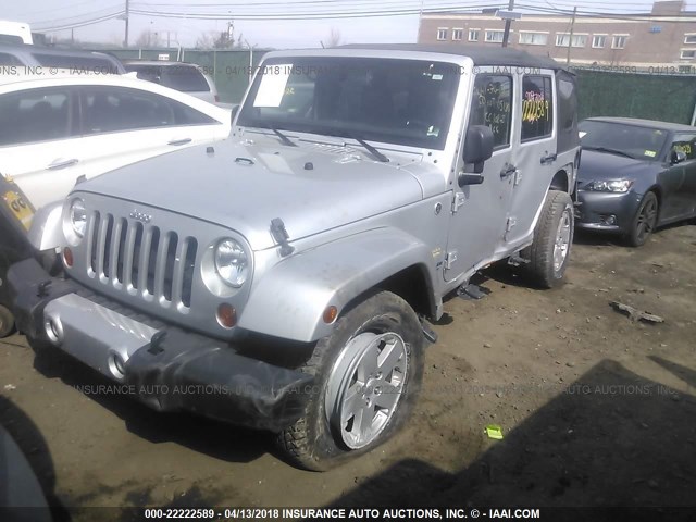 1C4HJWEG4CL191272 - 2012 JEEP WRANGLER UNLIMITE SAHARA SILVER photo 2