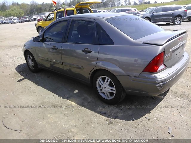 1FAFP3438YW314702 - 2000 FORD FOCUS SE/SE SPORT GRAY photo 6