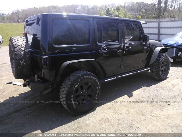 1C4BJWEG8DL565101 - 2013 JEEP WRANGLER UNLIMITE SAHARA BLACK photo 4