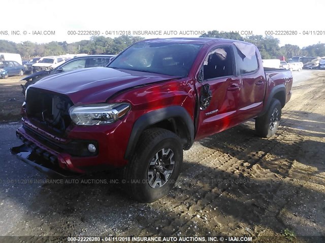 5TFCZ5AN3HX062795 - 2017 TOYOTA TACOMA DBL CAB/SR/TRDSPT/OR/PRO RED photo 2