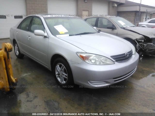 4T1BE32K03U713063 - 2003 TOYOTA CAMRY LE/XLE/SE SILVER photo 1