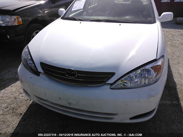 4T1BE32K94U288024 - 2004 TOYOTA CAMRY LE/XLE/SE WHITE photo 6