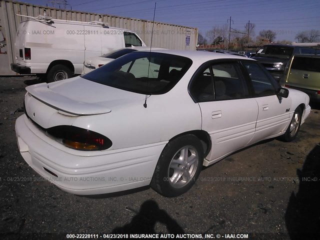 1G2HX52K3XH242758 - 1999 PONTIAC BONNEVILLE SE WHITE photo 4