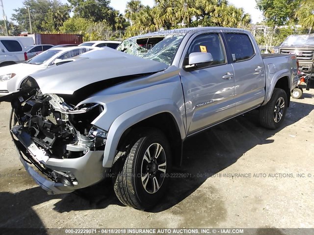 3TMCZ5AN8GM032891 - 2016 TOYOTA TACOMA DBL CAB/SR/SR5/TRD SPT/OR SILVER photo 2