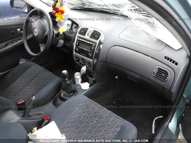 JM1BJ226710446750 - 2001 MAZDA PROTEGE LX/ES ტალღისფერი ფოტო 5