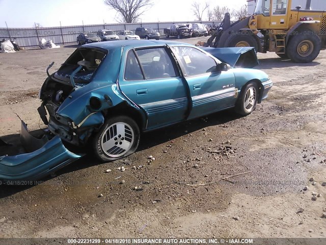 1G2NE54N3NC300944 - 1992 PONTIAC GRAND AM SE GREEN photo 4