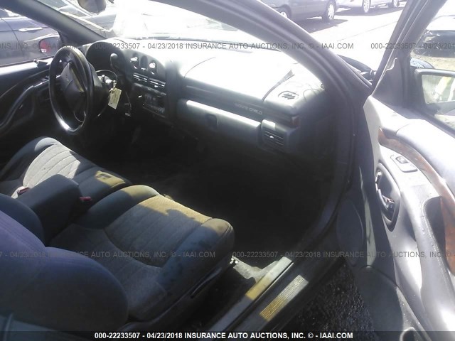 2G1WW12M5X9263124 - 1999 CHEVROLET MONTE CARLO LS მწვანე ფოტო 5