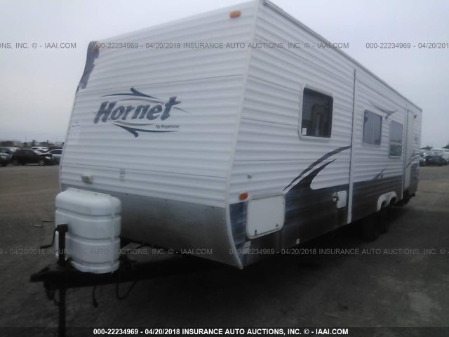 4YDT30B216E322948 - 2006 KEYSTONE HORNET BLUE photo 2