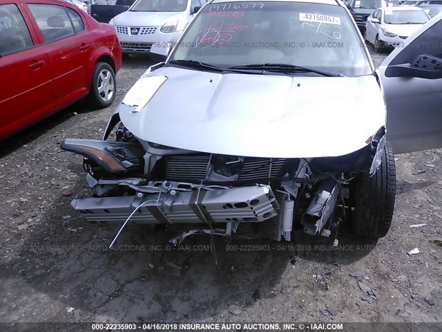 1FAHP3GN4BW162401 - 2011 FORD FOCUS SES SILVER photo 6