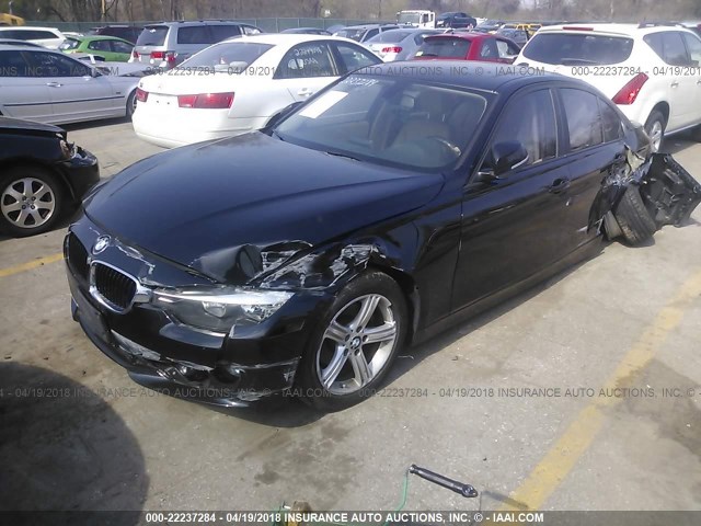 WBA3C3C57DF979979 - 2013 BMW 320 I/XDRIVE Schwarz Foto 2