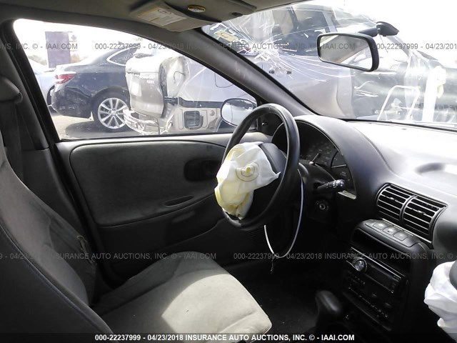 1G8ZH5289XZ319509 - 1999 SATURN SL1 WHITE photo 5