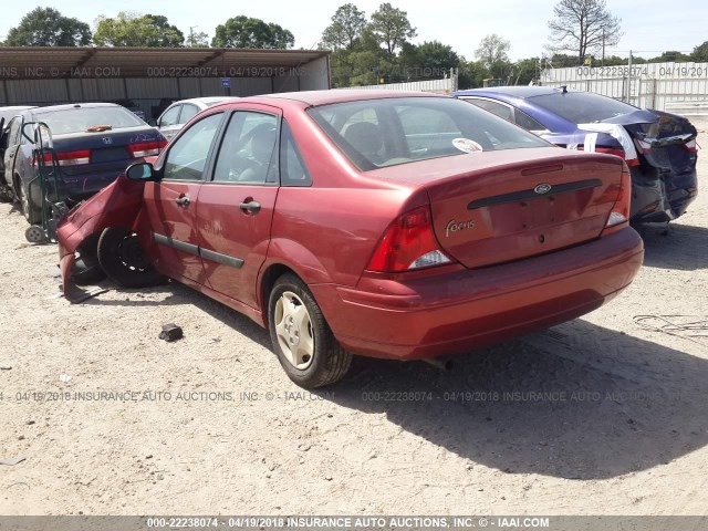 1FAFP33P61W142812 - 2001 FORD FOCUS LX RED photo 3